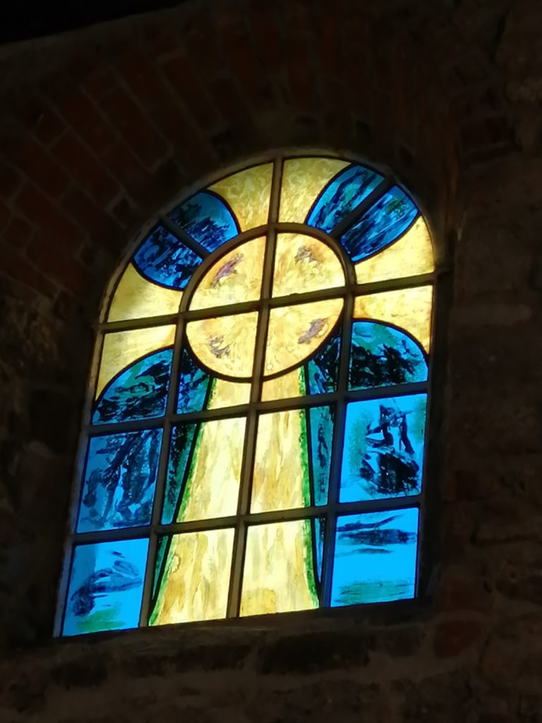 The stained glass window by Mary Hyaman, in the chapel.