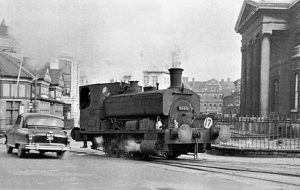 Old photo of Swansea museum with steam engine